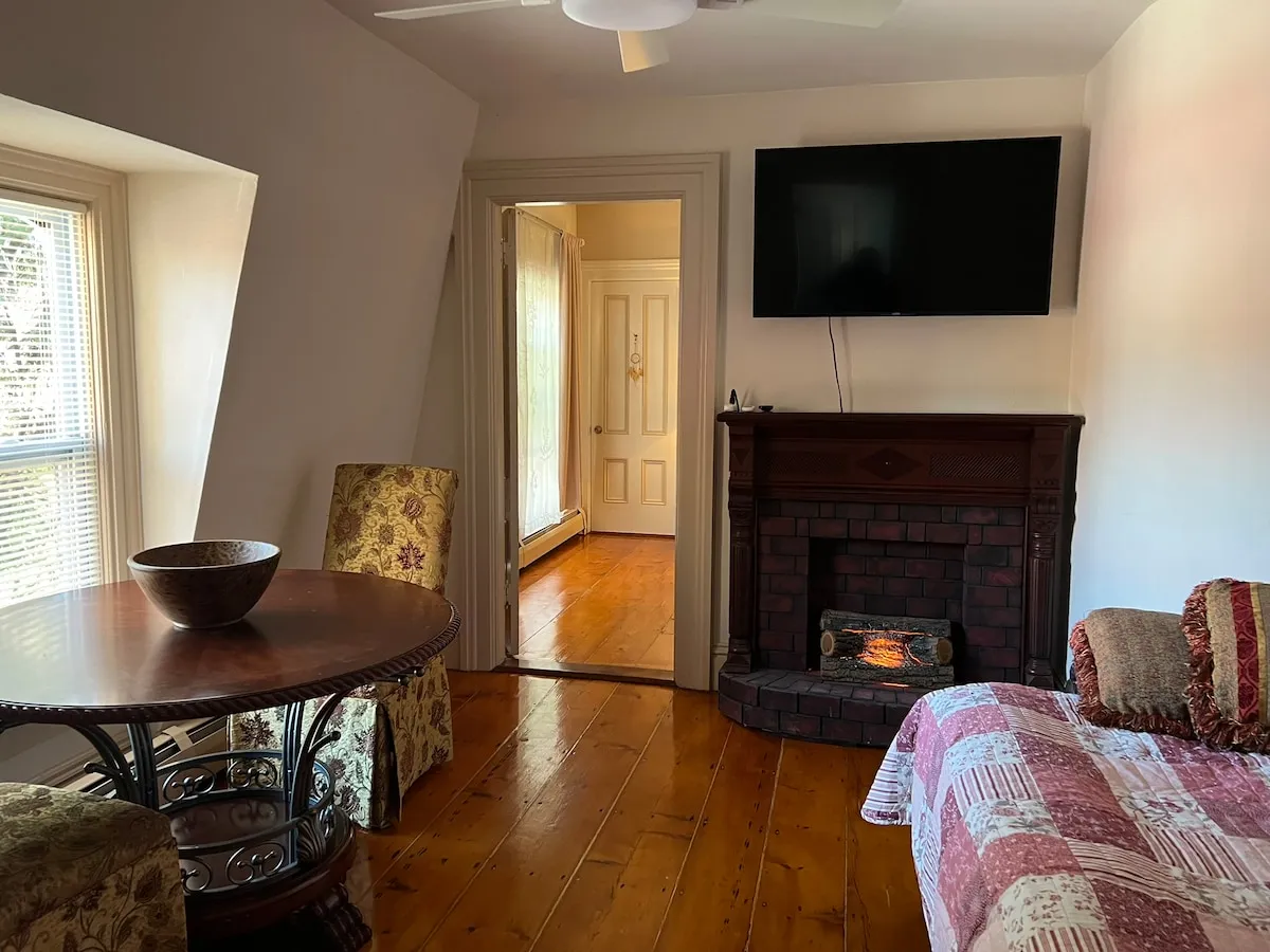 The sitting room, with the hall to the bedroom beyond